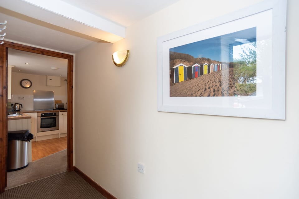 Step inside and feel instantly at home with practical storage and easy access to the cottage living spaces.