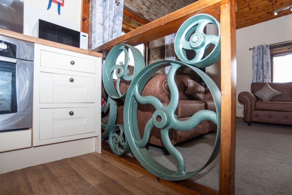 Unique original mill feature, celebrating the heritage and charm of this beautifully converted countryside cottage at Old Mill Cottages