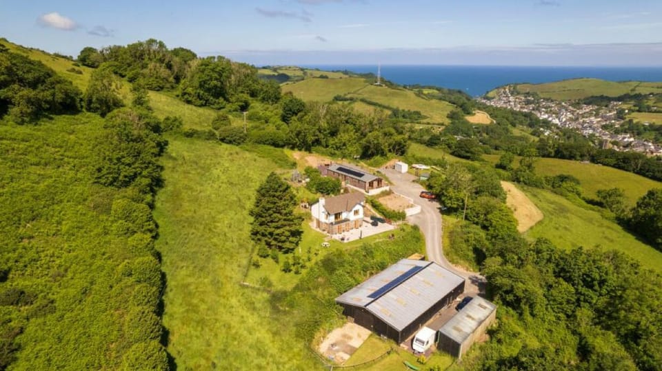 Combe Martin village and the view of the sea Guyscliffe Farm  driveway up to the house