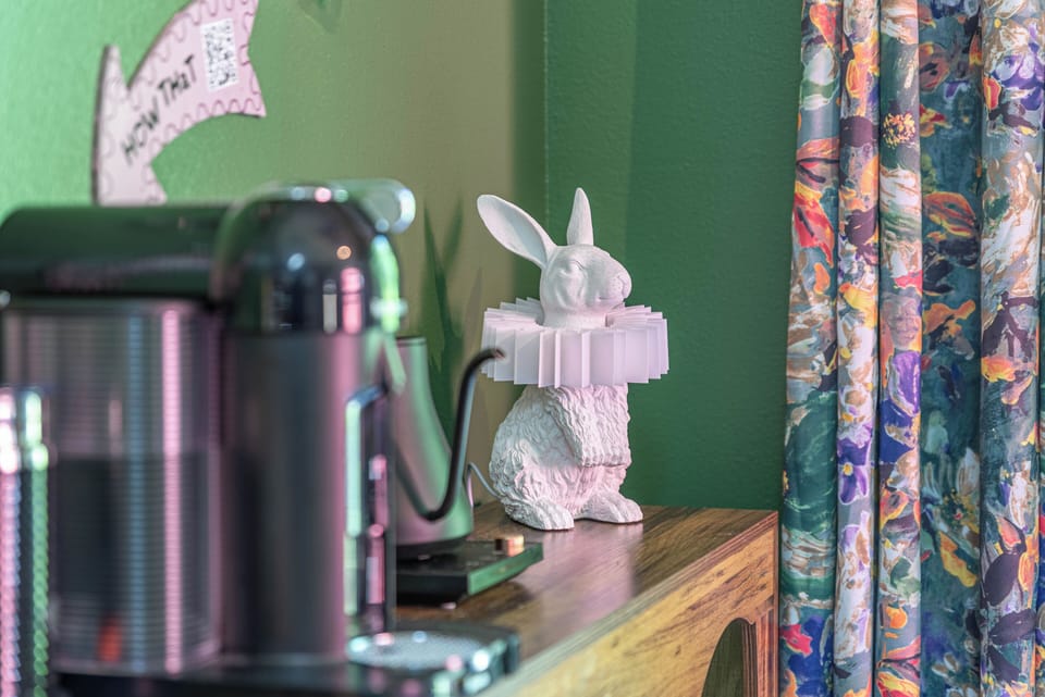 Enjoy a cozy coffee moment with friends and family in this charming corner, where thoughtful details and playful décor create the perfect setting to start your day together or unwind with a warm drink and great conversation.