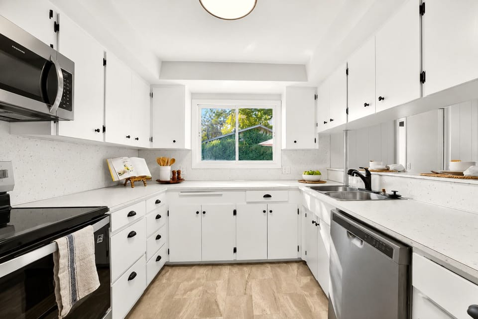 A kitchen stocked with everything you need to create gourmet creations and feed a crowd. 
