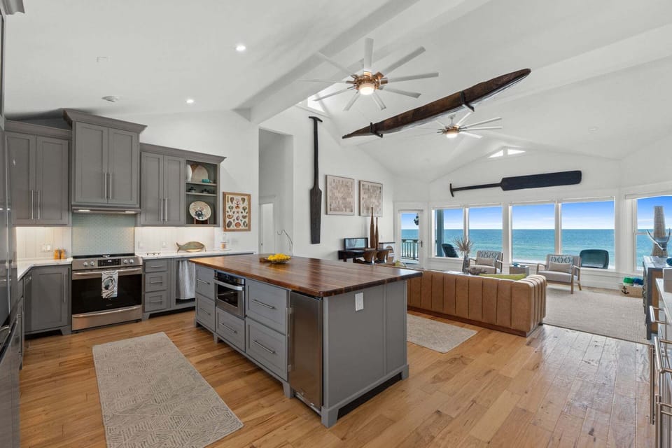 Dreamy kitchen with top of the line appliances and butcher block island