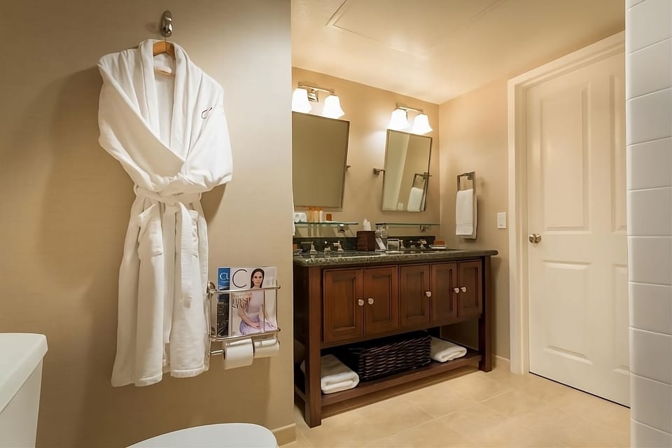 Start your day in a spotless bath with plush robe.
