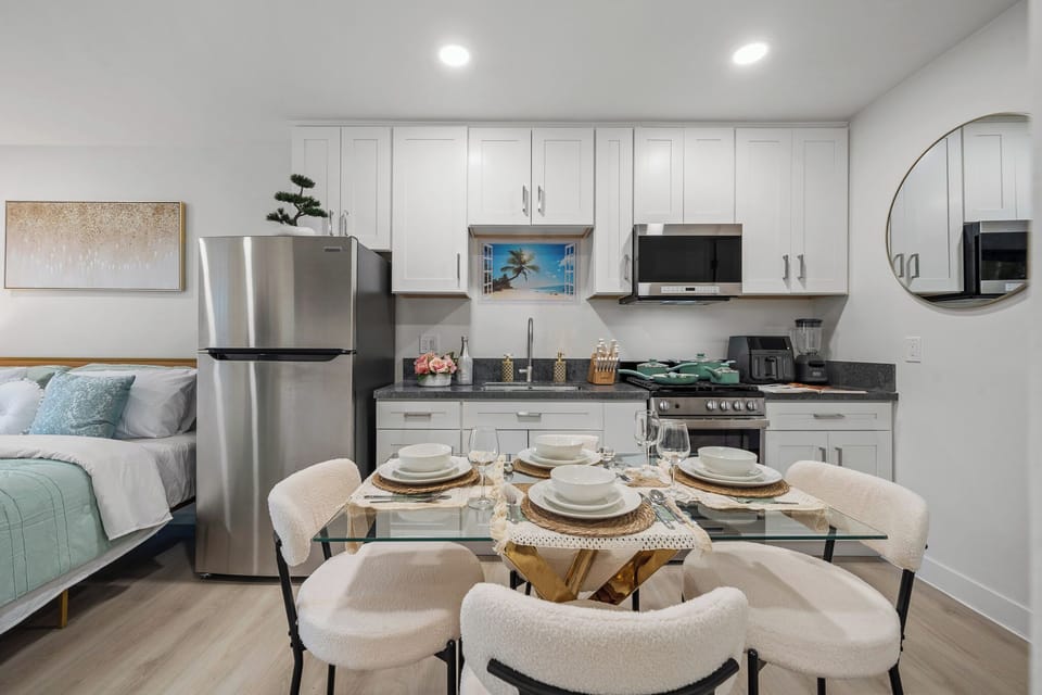 Open-concept layout combining the kitchen, dining, and sleeping areas.