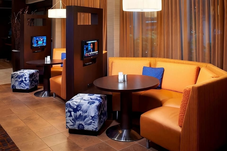 Settle into warm booths for relaxed evening conversation.