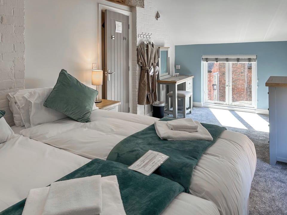 Twin bedroom | Farmhouse Cottage, Kirk Langley