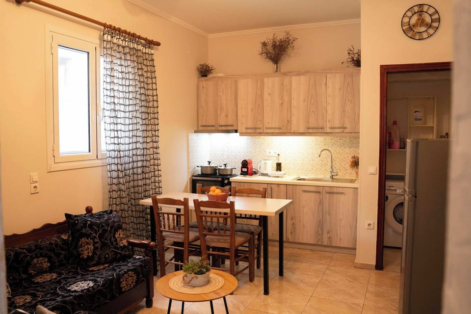 Fully equipped kitchen with dining table for comfortable meals at home