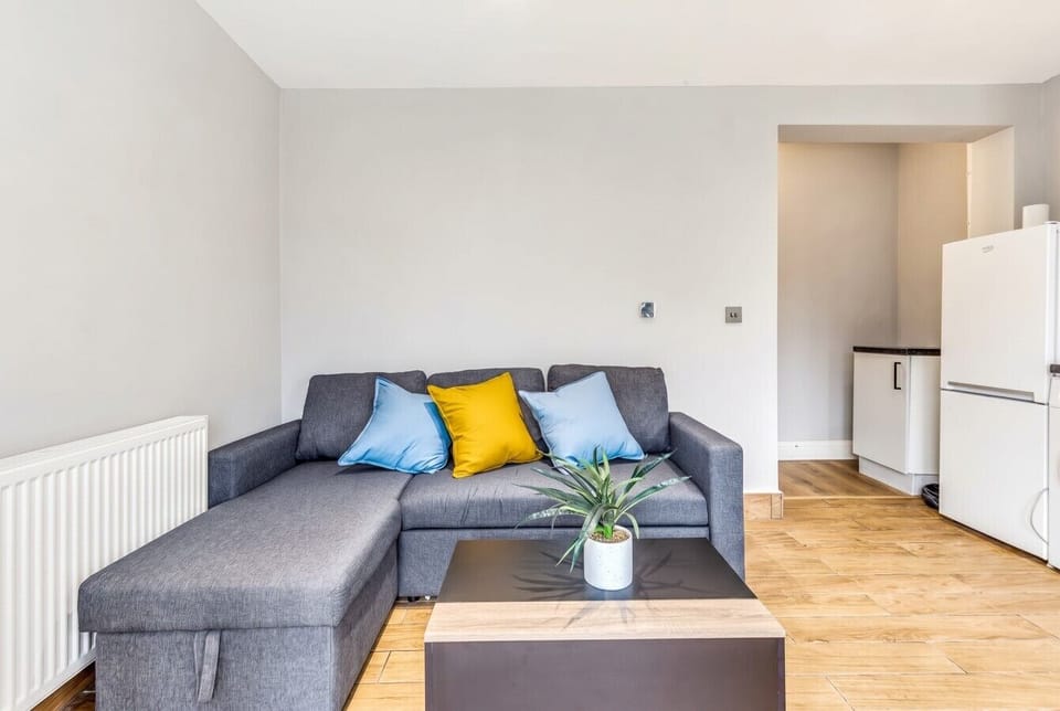 Comfortable lounge with bright colour accents and natural light