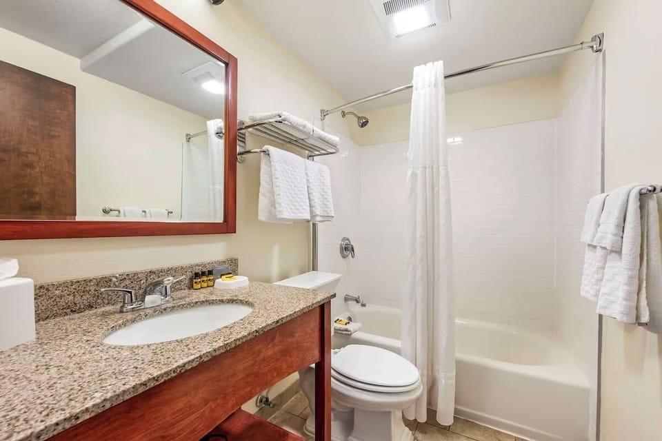 Refresh under a hot shower with fluffy towels waiting.