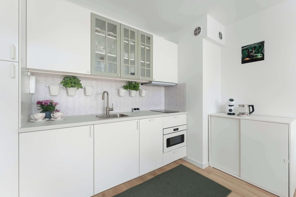 The fully equipped kitchenette includes everything you need for a home-cooked meal.