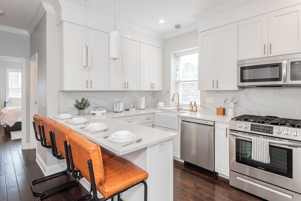 Gourmet Kitchen – Fully equipped with stainless steel appliances and all the necessities for home cooking.