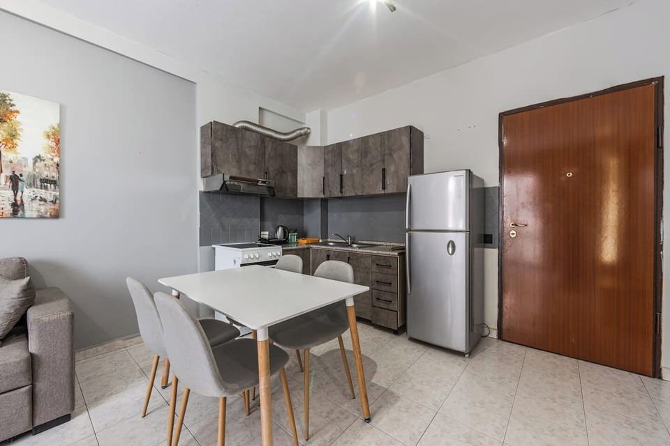 Fully-equipped kitchen and dining area
