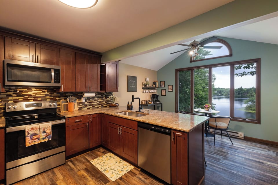 Cook together while enjoying beautiful lake views through oversized windows.