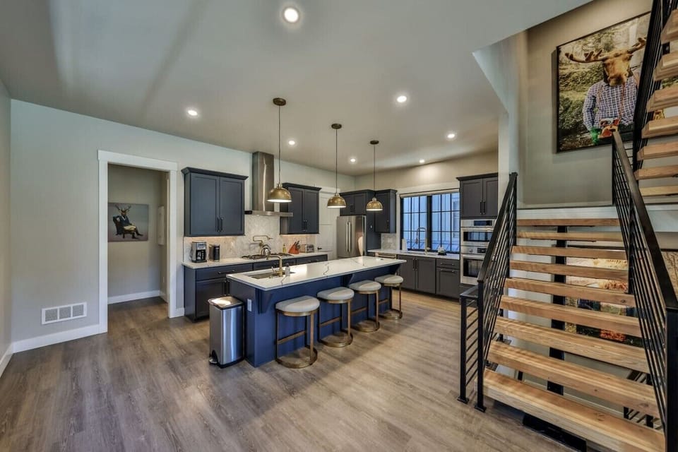 Fully stocked chef`s kitchen with bar seating