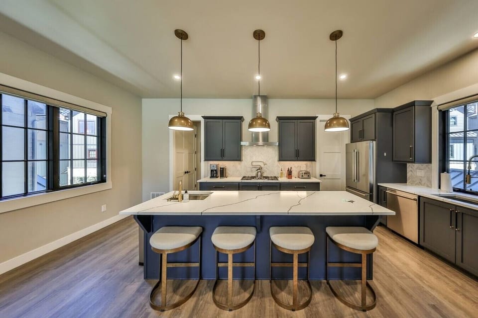Fully stocked chef`s kitchen with bar seating
