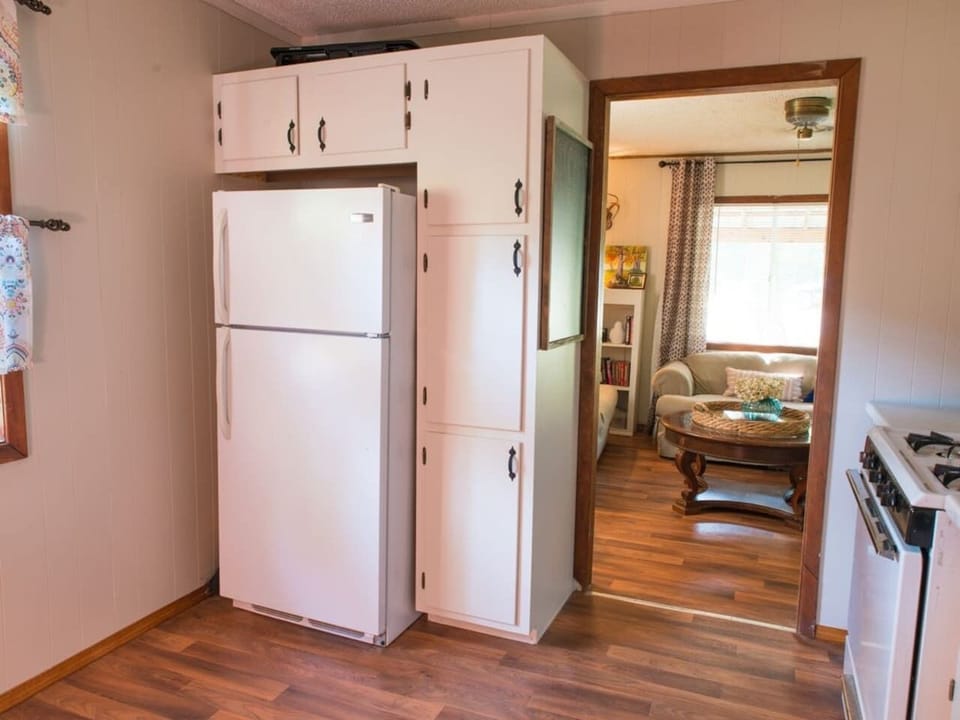 There’s enough cabinet and fridge space in the kitchen to store all your favorite snacks and treats.