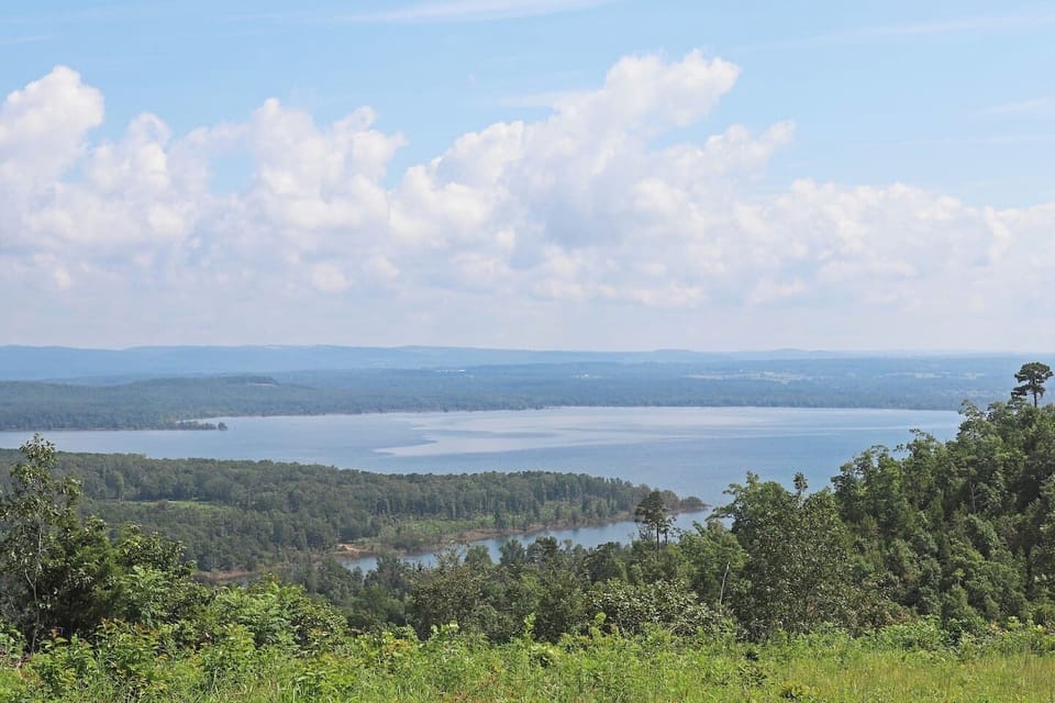 The tranquil beauty of Greers Ferry Lake and the majesty of the Ozarks are visible out every window as you make your way to the cottage.