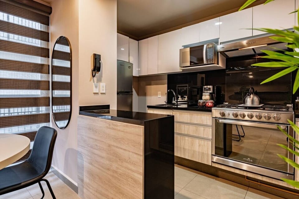 Compact kitchen with everything you need to cook up a real meal.
