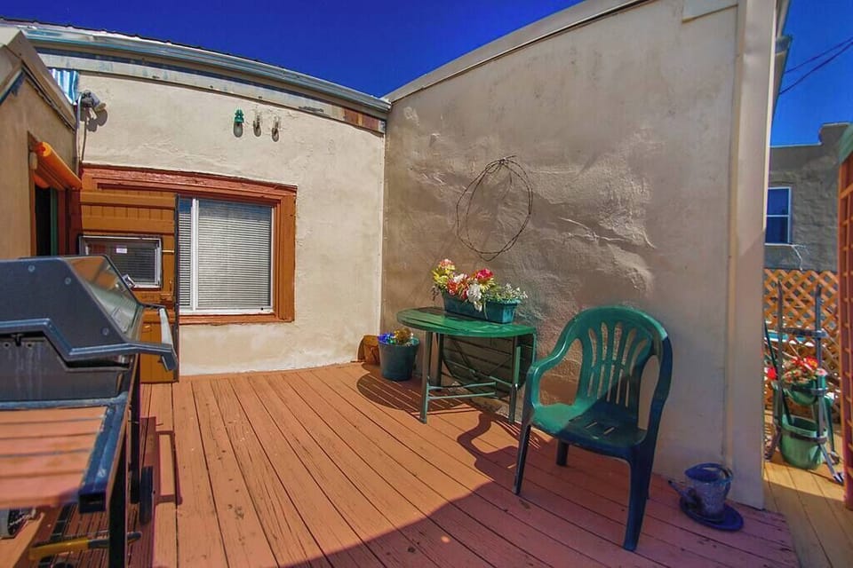 Entrance to Roof Top Deck outside of Coffee Tea Room -- complete with weber grill, plenty of patio furniture to sprawl and a hammock!