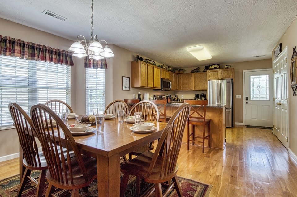Pigeon Forge Pet Friendly Cabin "Riverstone Retreat" - Dining room and fully furnished kitchen