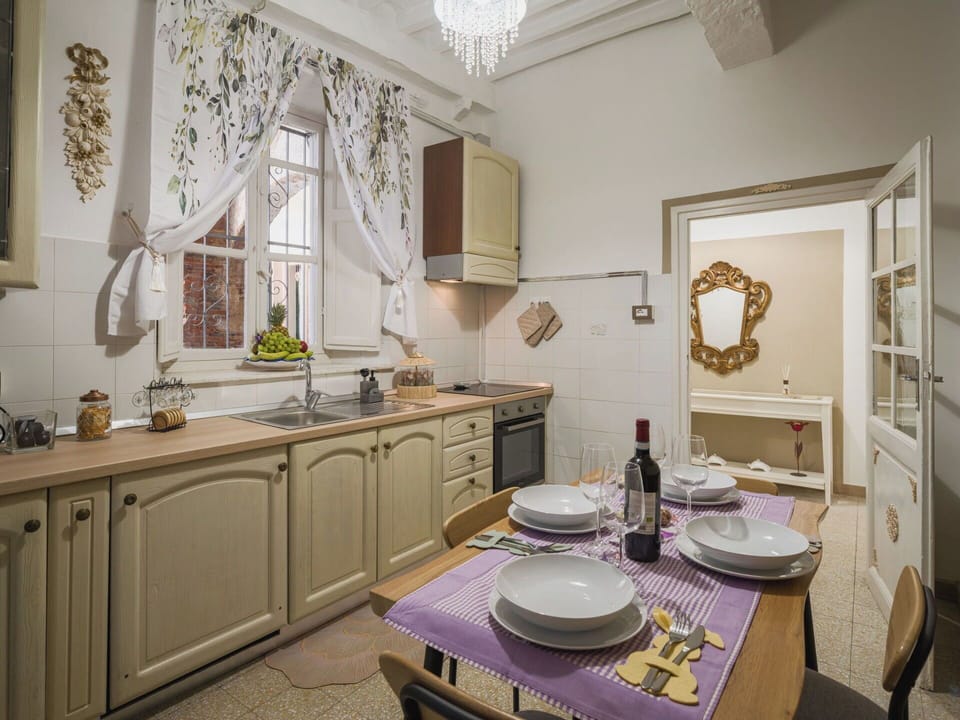 Furniture, Interior Design, Wood, Flooring, Cabinetry, Room, Kitchen, Ceiling, Lighting, Floor