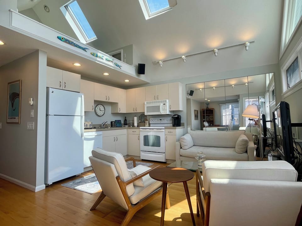 Living area and fully equipped kitchen