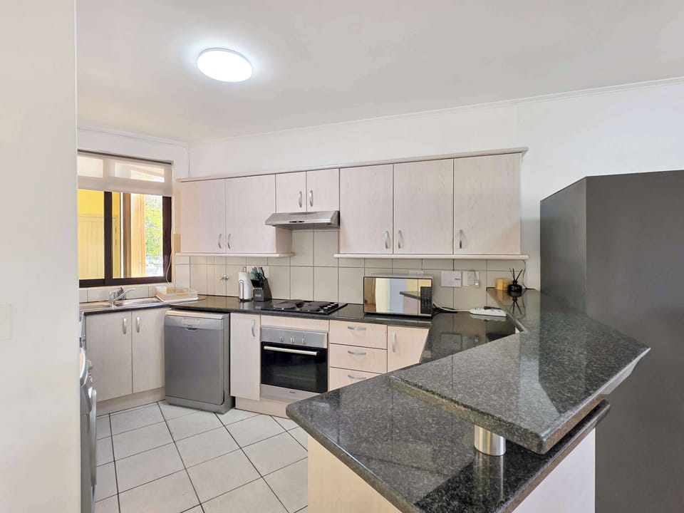 Let me take you on a virtual tour through the apartment. As you enter to your left you'll find a fully equipped kitchen. Fitted with a refrigerator, dishwasher, stove, oven, toaster, kettle, microwave, essentials you'll need.