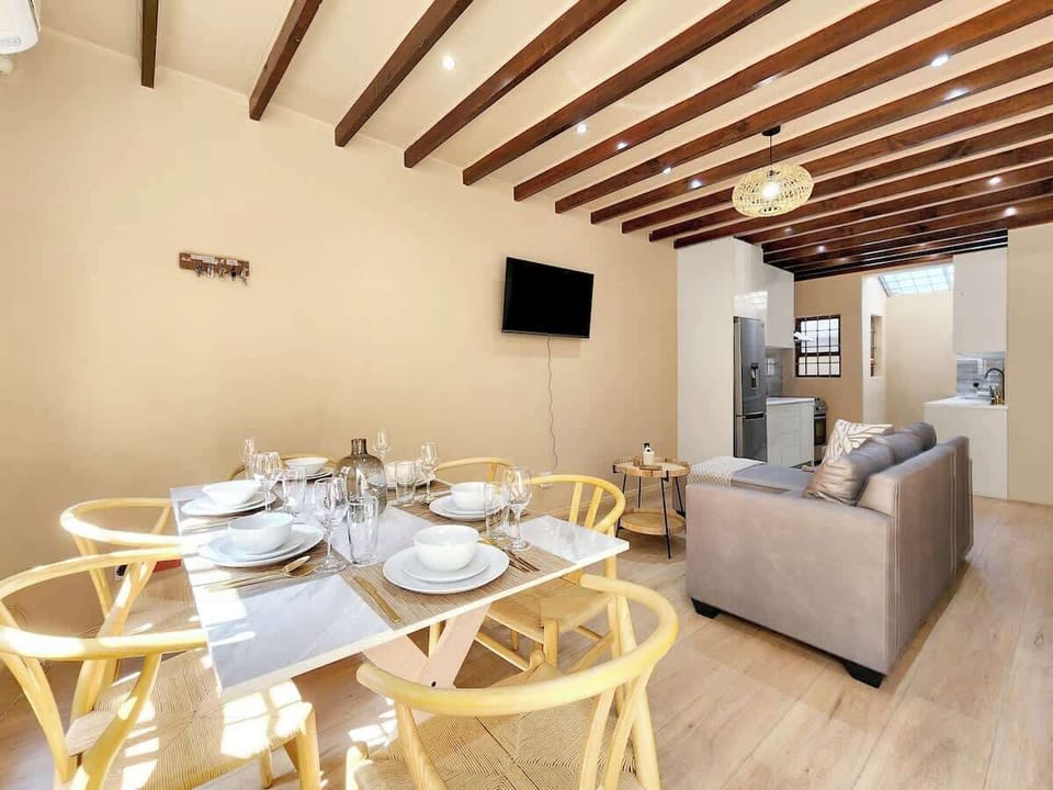 Dining for 6 guests. Enjoy lovely breakfast, lunches or dinners together, making memories. Kitchen has plates, side plates, bowls, cutlery, placemats, glasses, wine glasses, serving dishes, salad bowls, pots, pans, knives and all you will need. 
