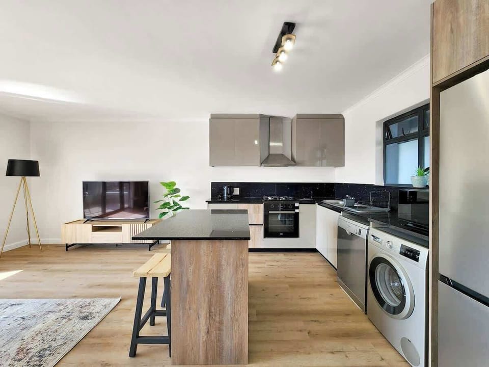 As you enter the  apartment you will find the kitchen to your right. It is equipped with everything you need. Fridge, freezer, dishwasher, washing machine, oven, stove, microwave, coffee, tea, sugar, milk, salt, pepper, coffee plunger. cutlery. 