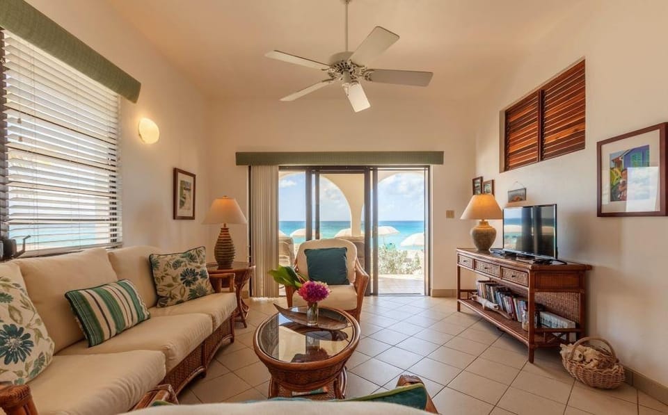 Stretch out on plush seating with the sea just outside.