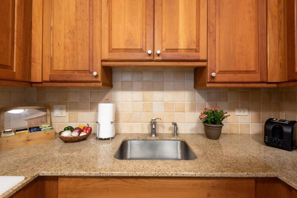 Prepare easy breakfasts in the tidy kitchen with ample counter space.