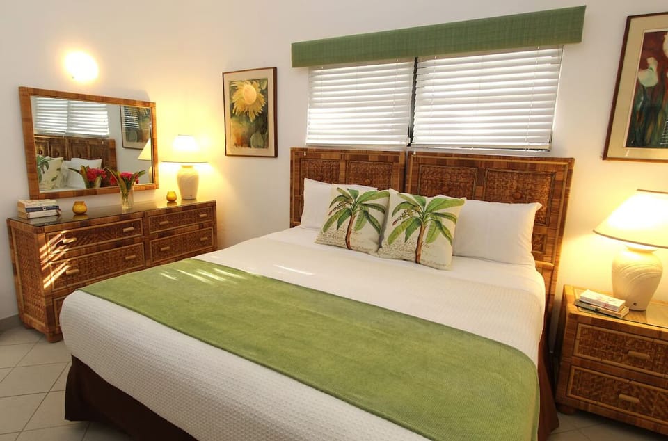 Unwind in crisp linens and island-inspired, cozy bedroom comfort.