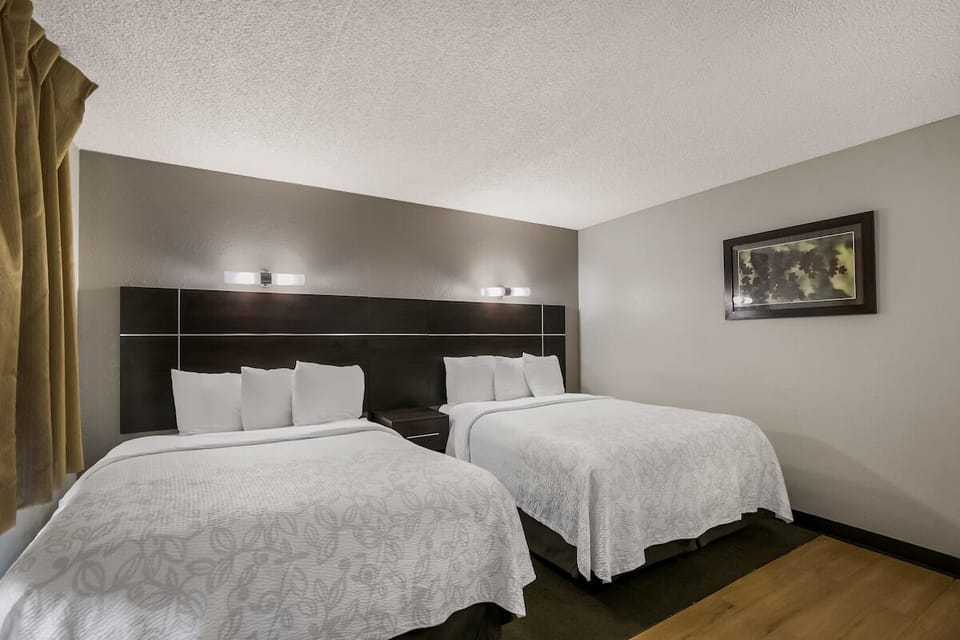 Drift off on crisp linens in a comfortable double-queen room.