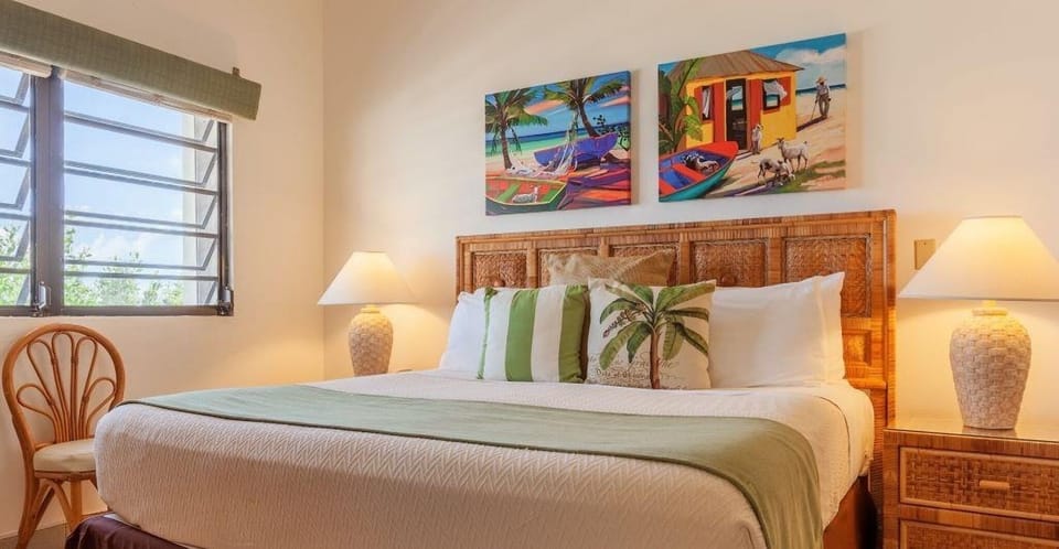 Recharge in a sunlit king room with island charm.