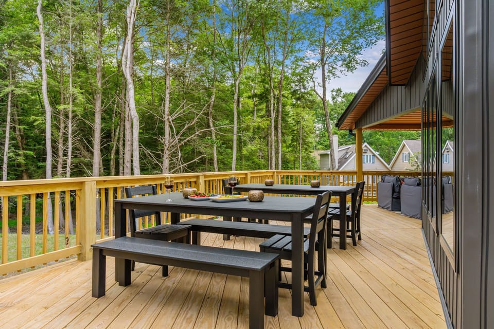 Upper deck dining with picnic-style table and bench seating