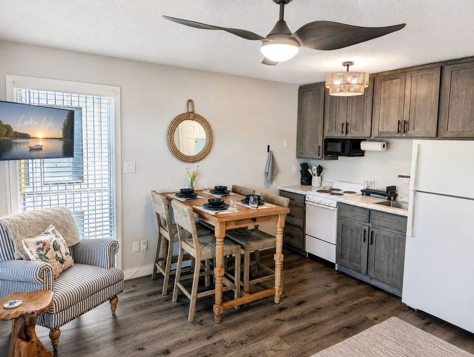Bright kitchen and dining nook with cozy seating and modern rustic style