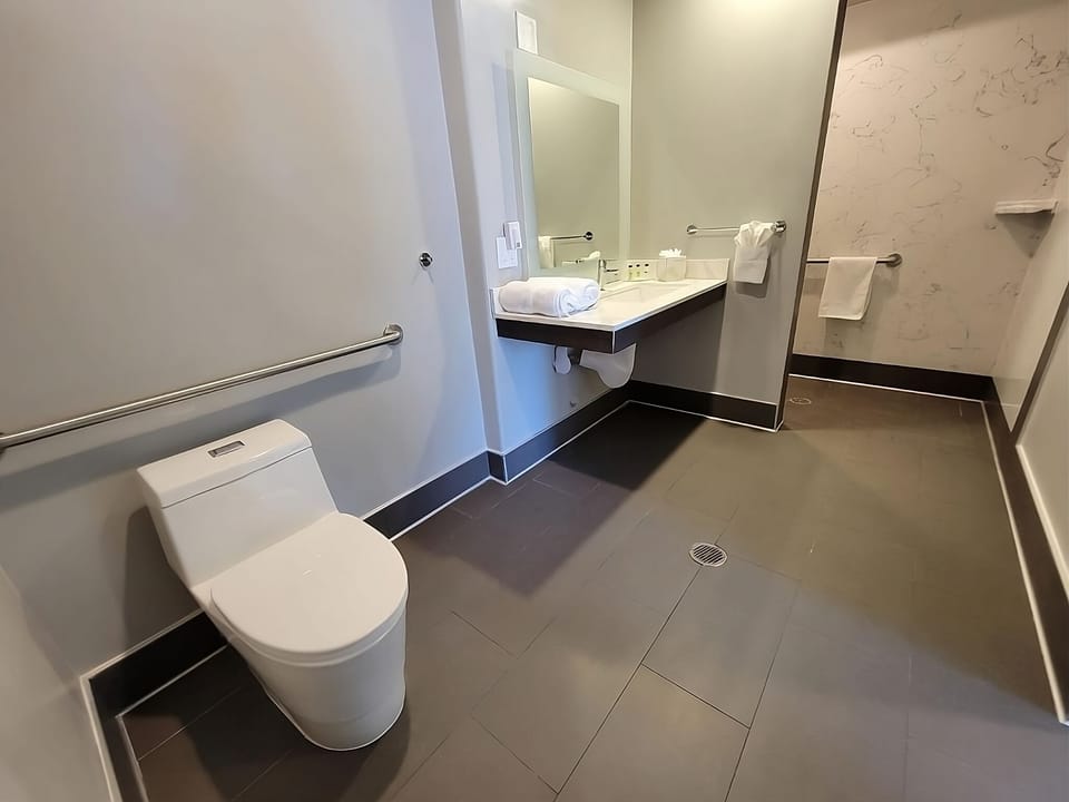 Refresh easily with spacious vanity and bright, clean finishes.