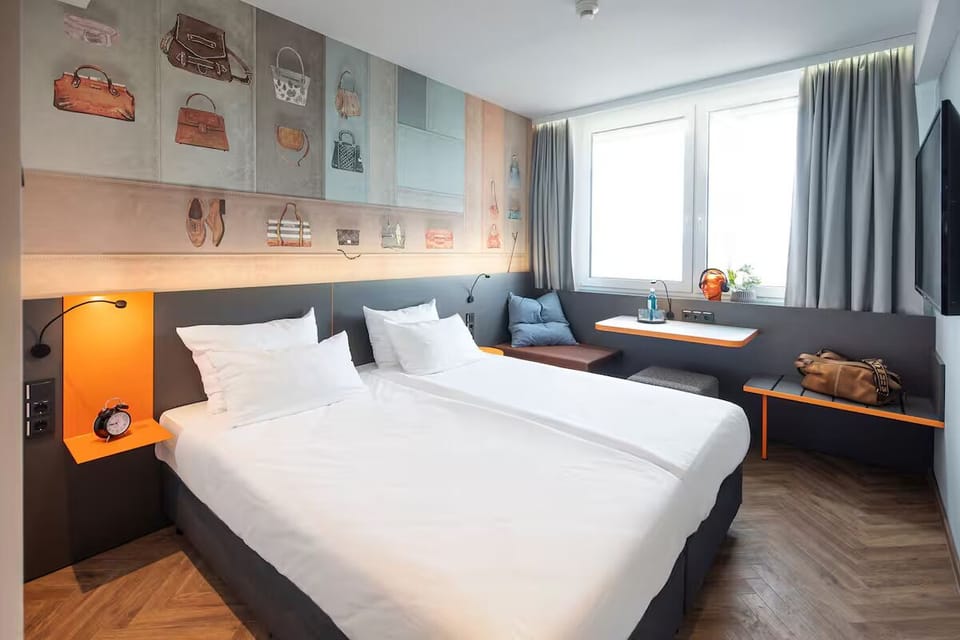 Arrive and relax in a stylish, light-filled bedroom retreat.