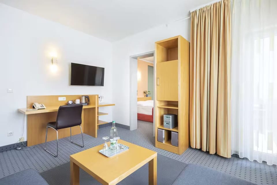 Settle in with a bright workspace and relaxed lounge area.