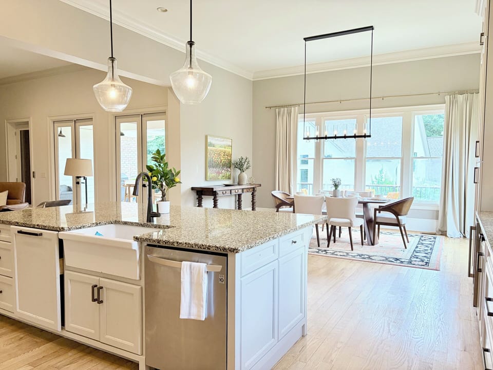 Open-concept layout connected to dining and living area