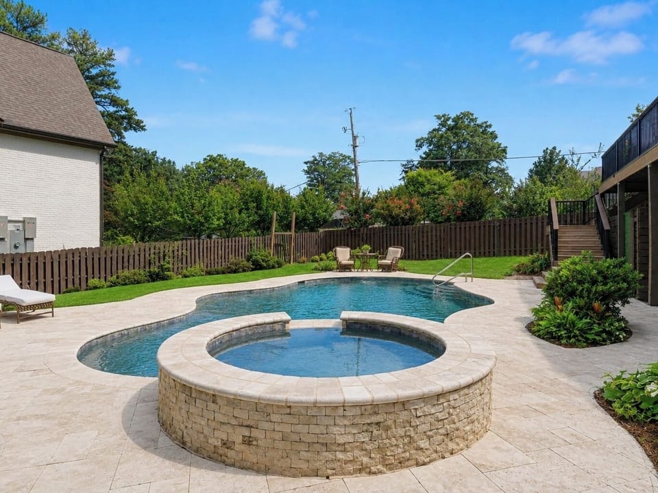 Spacious pool deck with ample seating