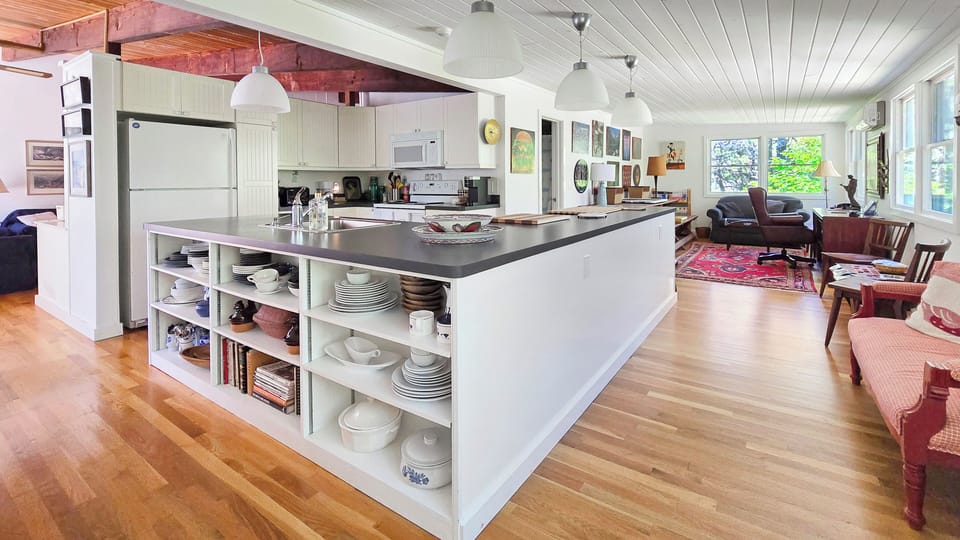 Bright kitchen opens to family room
