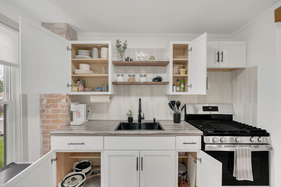 Fully stocked kitchen with all essentials. Cookware, dishes, coffee, and backing. 