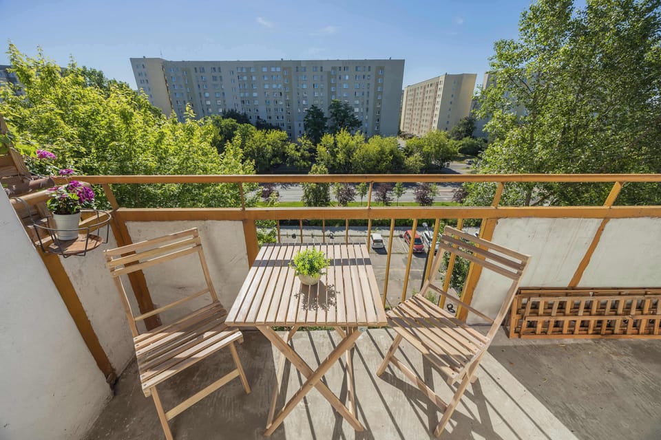 The balcony provides a perfect spot for enjoying the fresh air.
