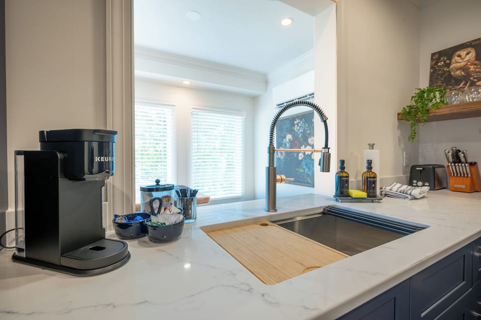 Bright, modern kitchen with a Keurig coffee station, spacious sink, and everything you need for easy meal prep.