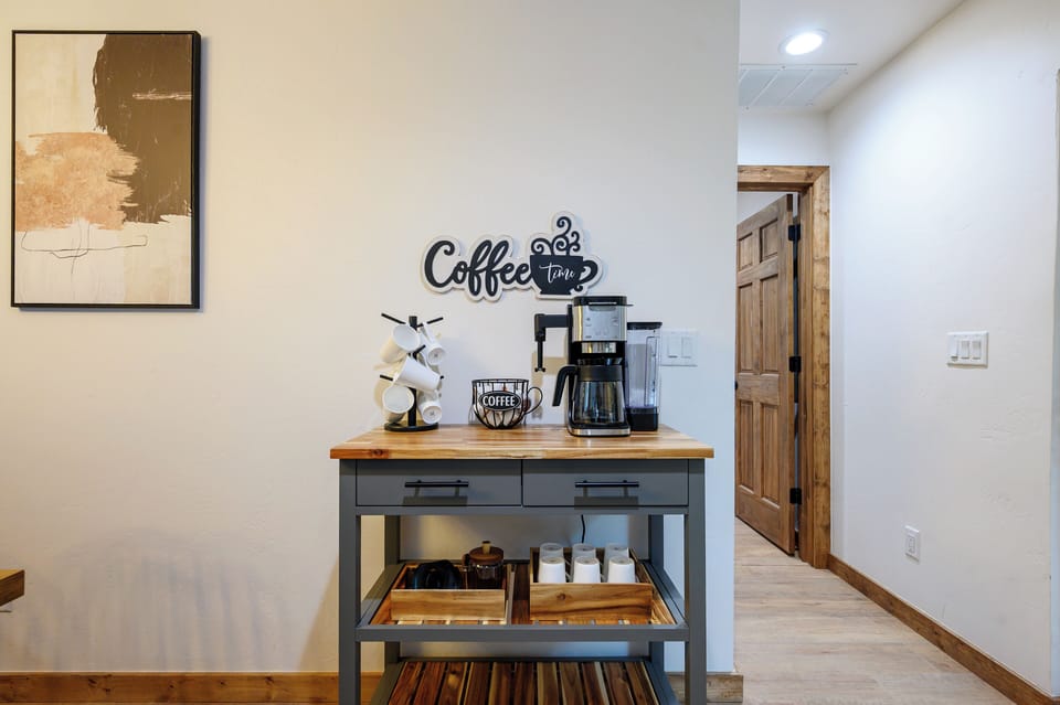 Cozy coffee bar with rustic style and convenient guest essentials