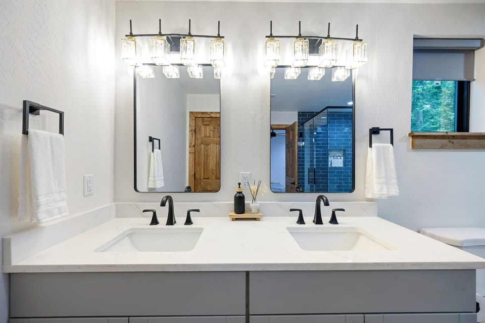 Bright double vanity with spa-like style and elegant modern finishes