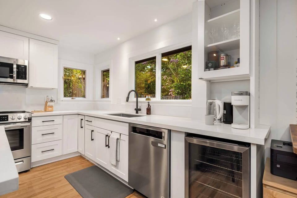 Convenient coffee station, dishwasher, and expansive countertops make meal prep a breeze.