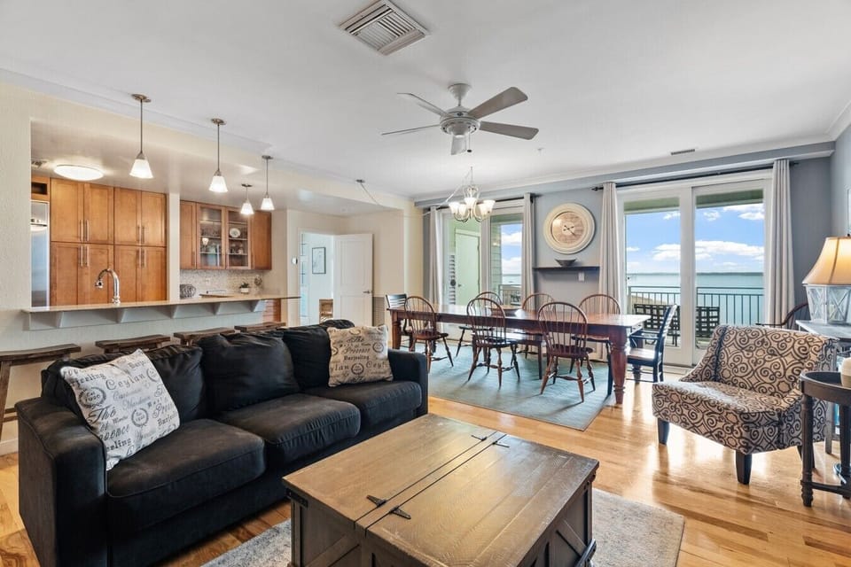 Whether you`re cooking, relaxing, or sharing meals together, everyone stays connected in this bright and inviting coastal retreat.