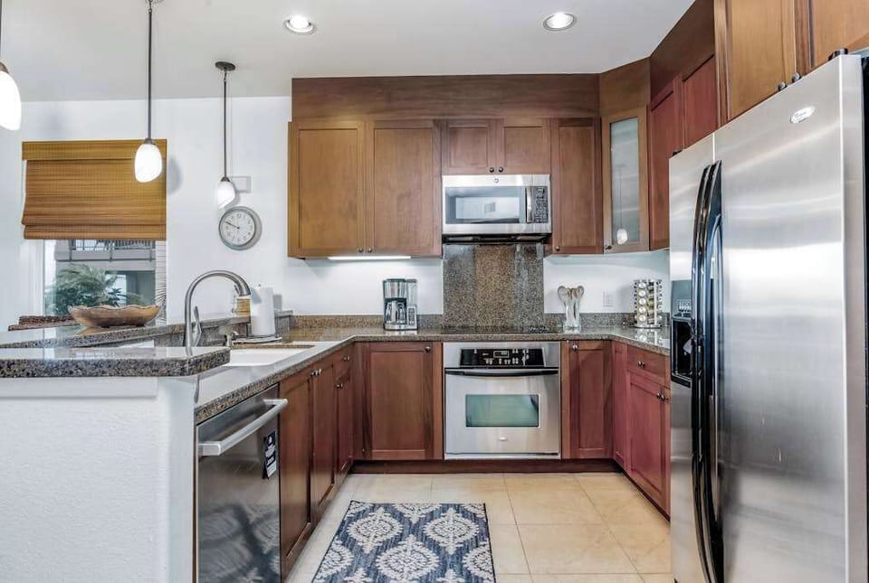Fully Equipped Modern Kitchen with Stainless Steel Appliances